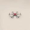 A high-definition and stable remote-controlled aerial vehicle with a red drone Application Scenario